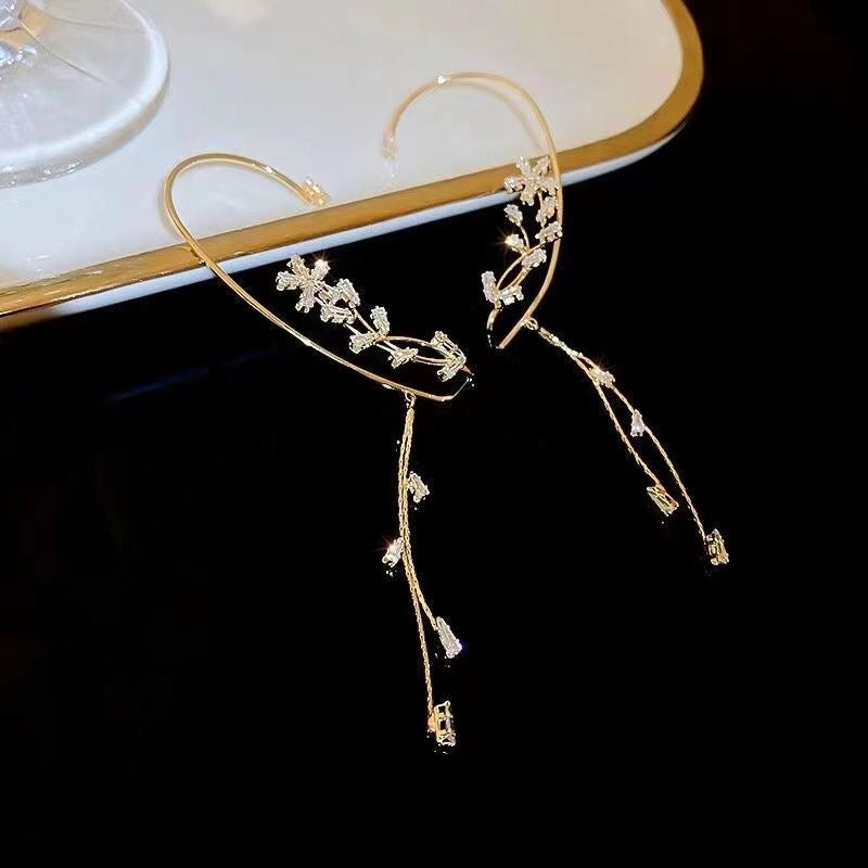 Pendientes de borlas en forma de copo de nieve