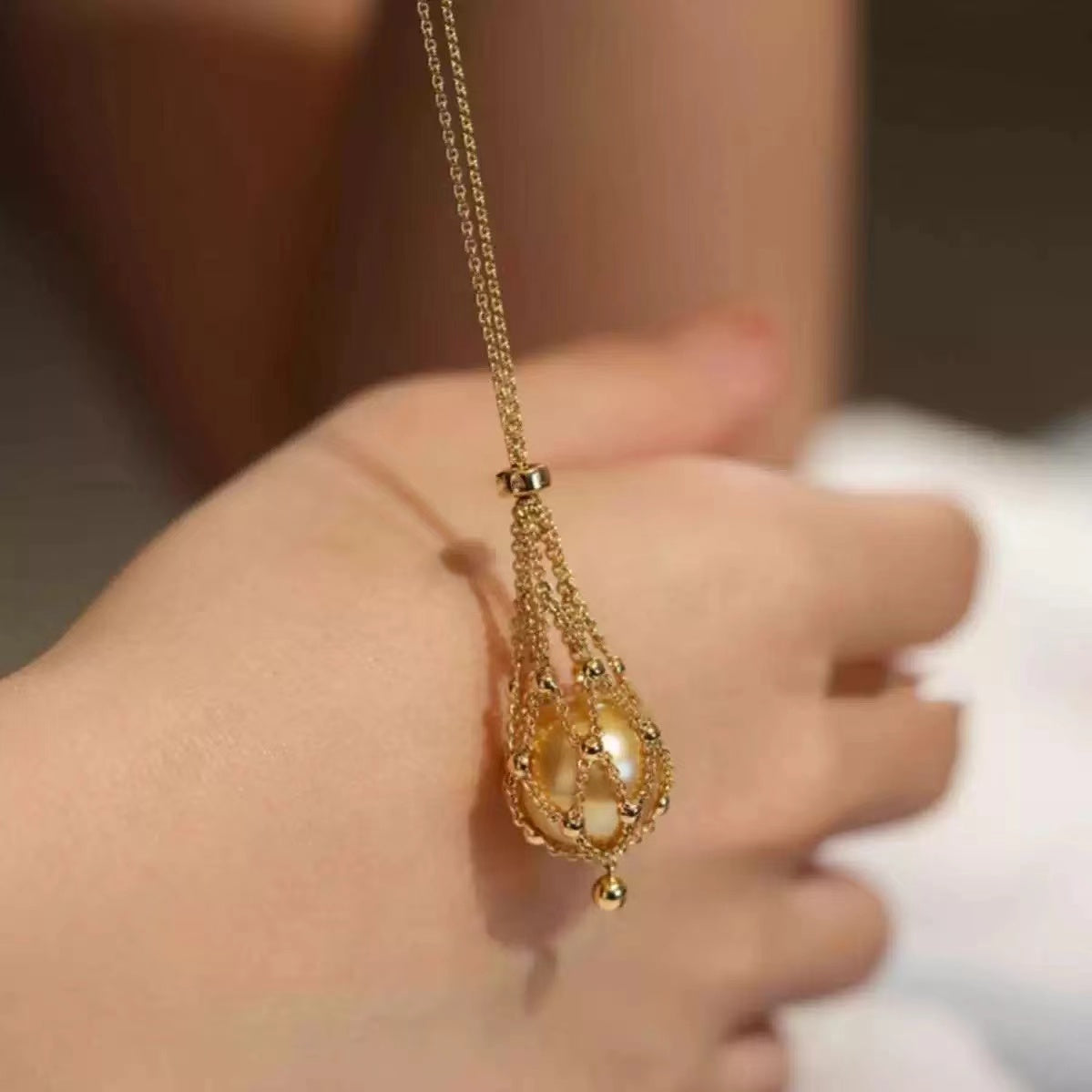 Close-up photo of Pearly Net Necklace showing net design and pearls
